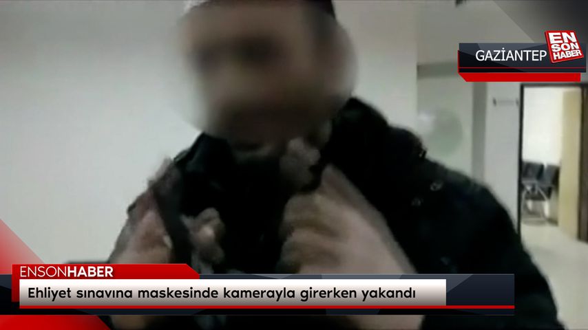 Ehliyet sınavına maskesinde kamerayla girerken yakandı