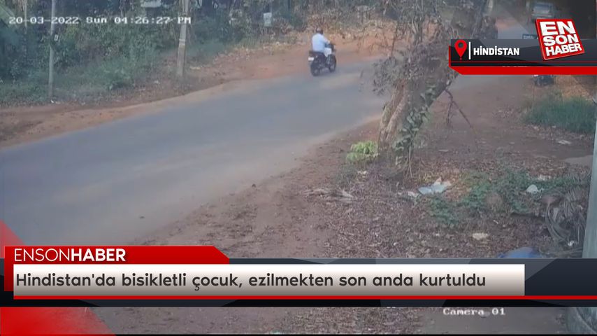 Hindistan’da bisikletli çocuk, ezilmekten son anda kurtuldu